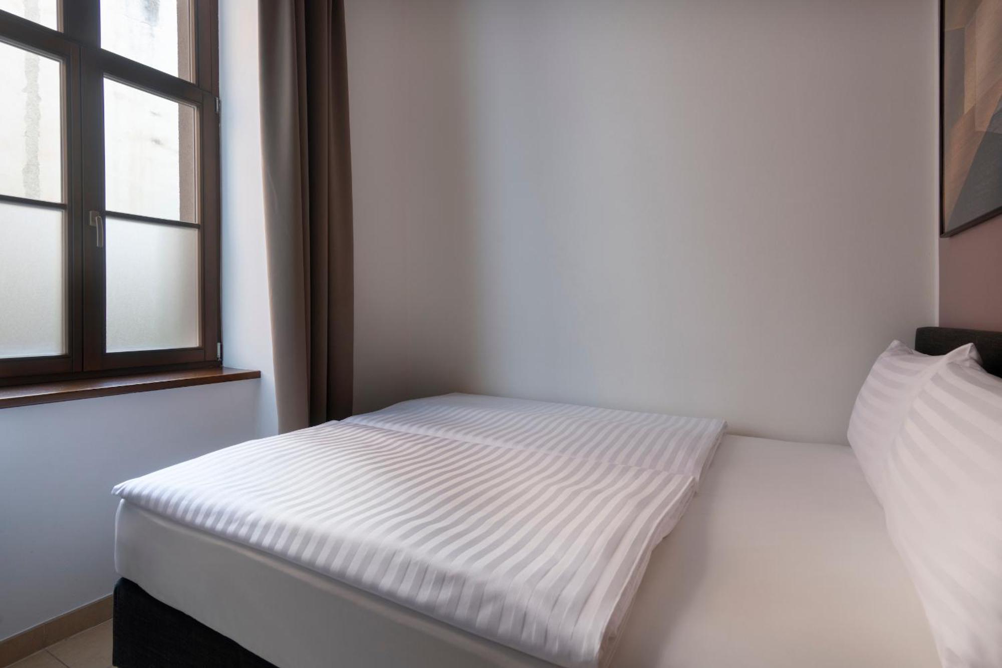 Bohemian Dreams Apartments And Suites By Dwellfort Prága Szoba fotó