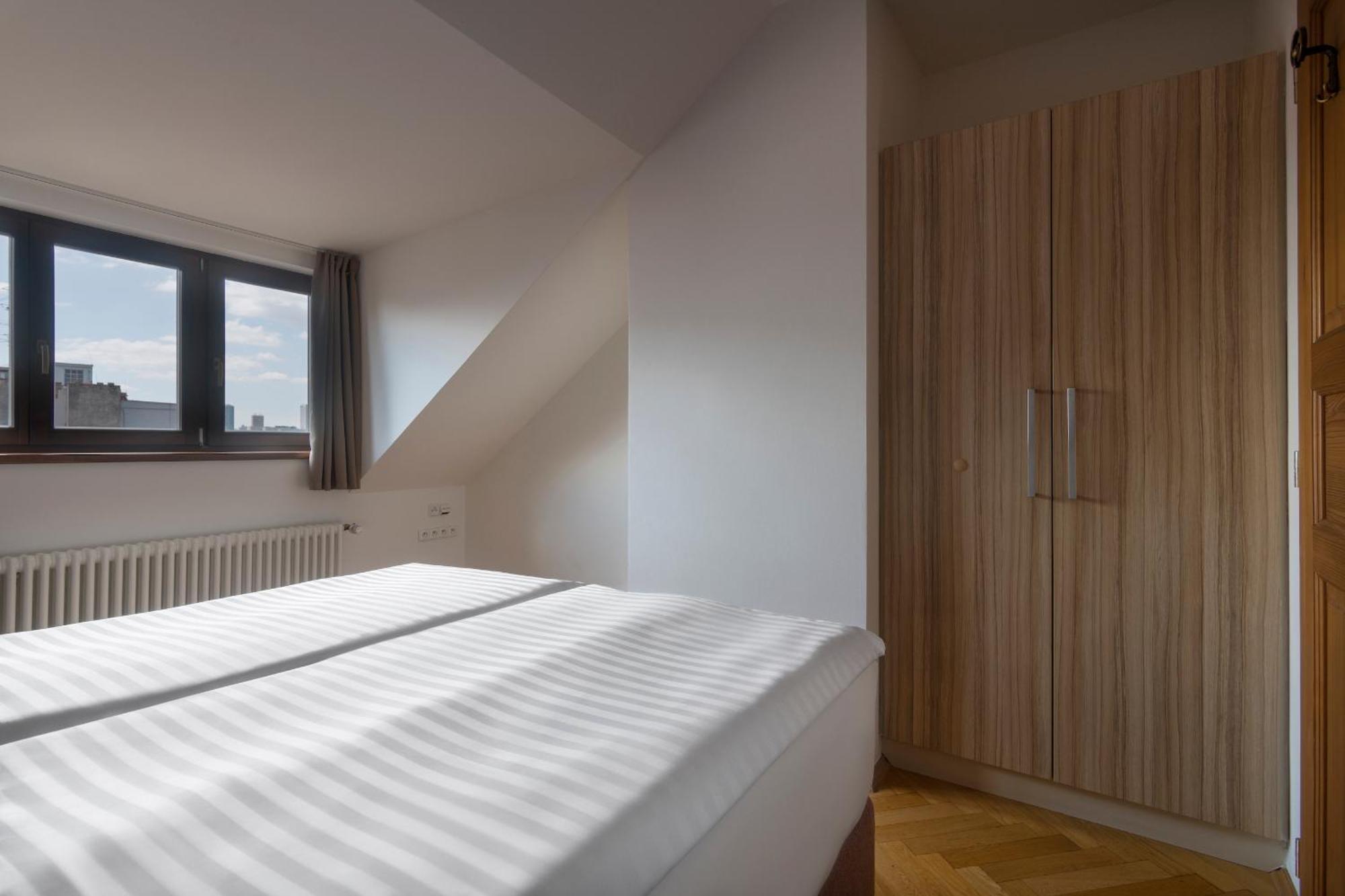Bohemian Dreams Apartments And Suites By Dwellfort Prága Szoba fotó