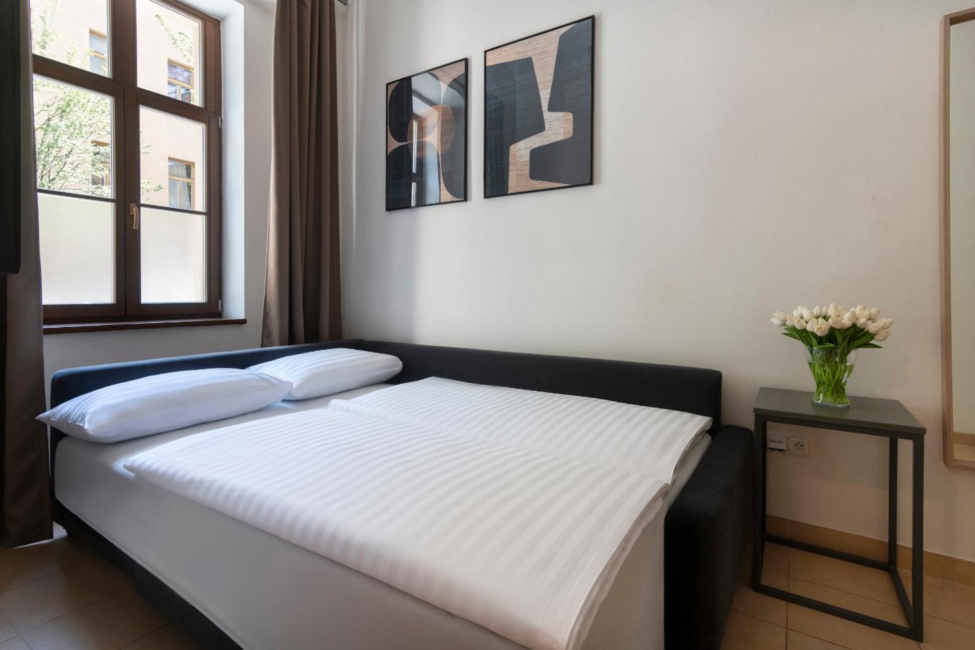 Bohemian Dreams Apartments And Suites By Dwellfort Prága Szoba fotó